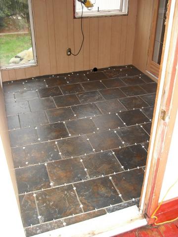 The hardest part of any tile job is to avoid tiling yourself into a corner, and then just keep on tiling up and around you until you cut off your supply of air. True, the grout spacers might save you.